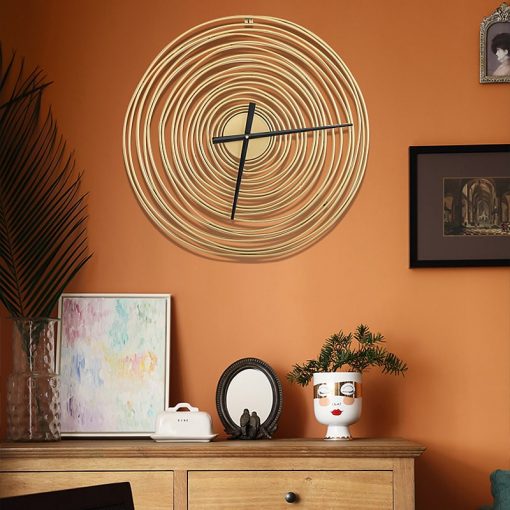 Horloge murale Design en métal pour une décoration dans le salon