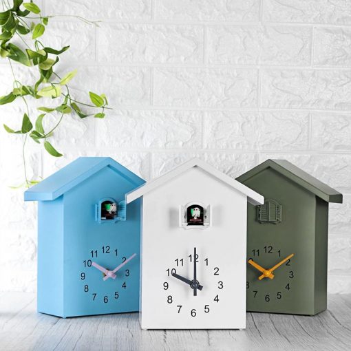 Horloge murale design avec coucou en forme d'oiseau